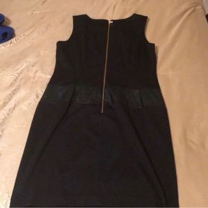 Black Calvin Klein sleeveless dress with gold details